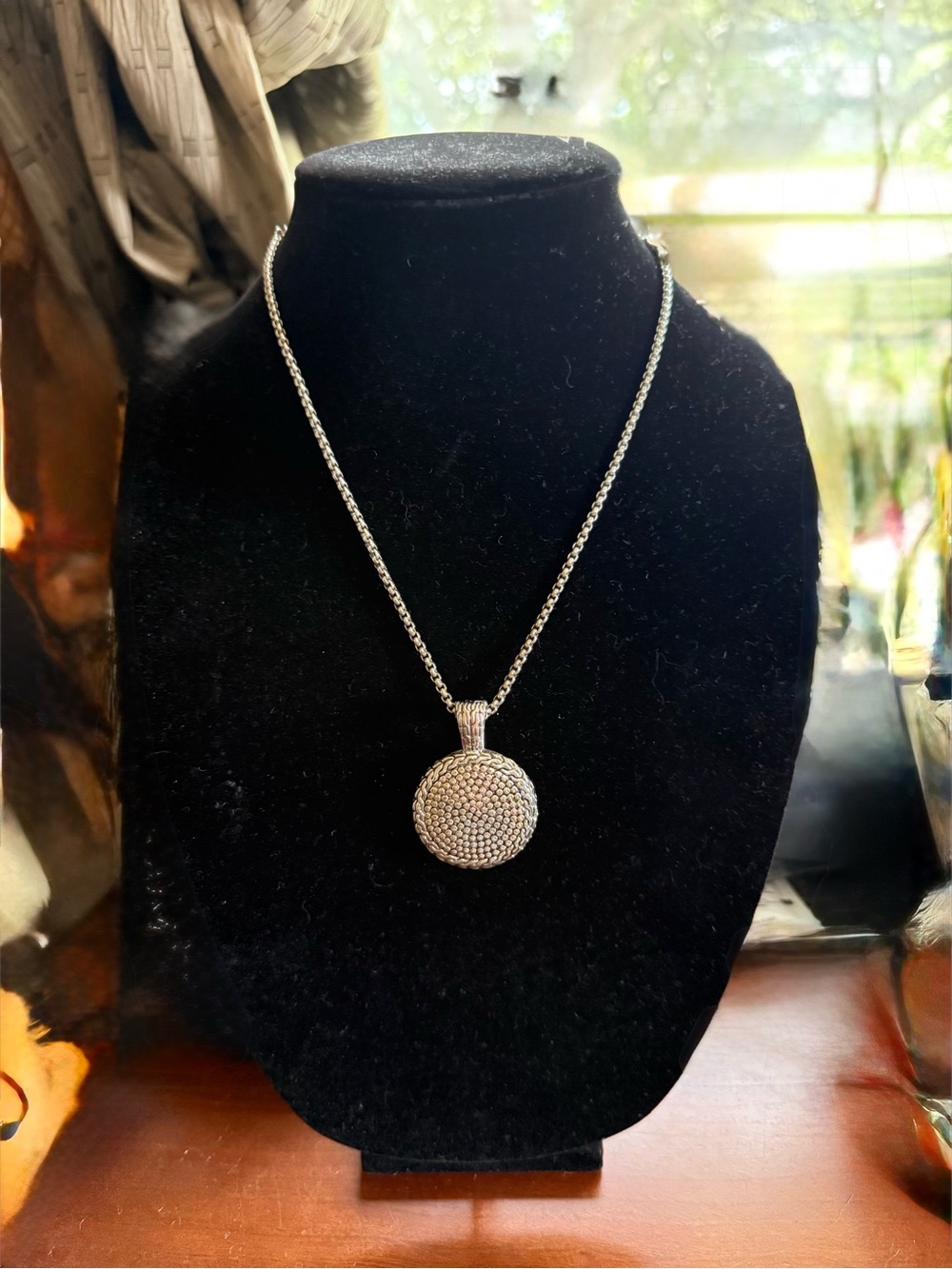 Silver Tone Round Pendant Necklace w/ textured dot pattern with a braided border